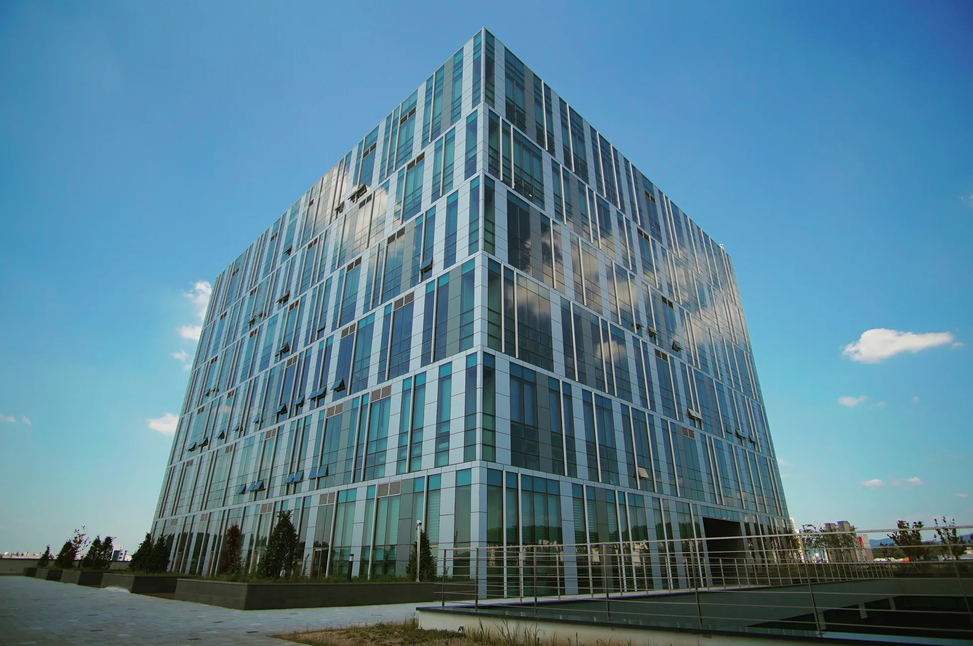 Illustrative scene: a corporate building in operation.